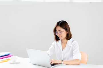 Happy business woman working in a office