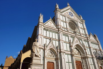 Fototapeta na wymiar Statue of Dante Alighieri, in Santa Croce square, Florence, Italy