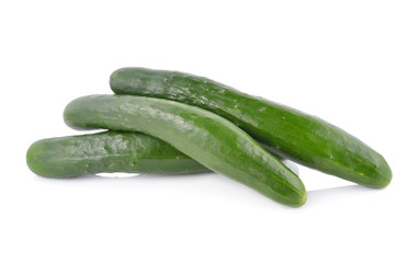whole fresh Japanese cucumbers on white background