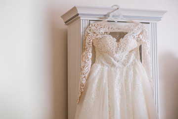 Beautiful tender wedding dress on wedding day close up