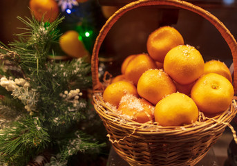 Basket with tangerines on a shop window