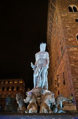 Fountain of Neptune at night in Florence, Italy