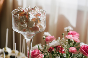 Variety of candies, cakes and cupcakes at the candy bar