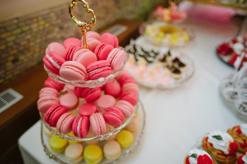 Variety of candies, cakes and cupcakes at the candy bar