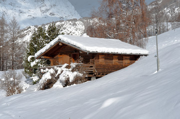 Chalet in the snow, Valtournenche, Italy