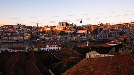 View of Ribeira at Douro river and Dom Luis I bridge, Porto - Portugal.