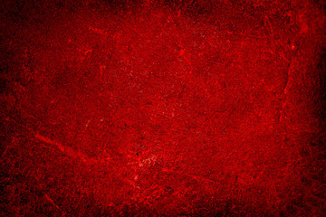 Abstract background the texture of painted concrete is bright red