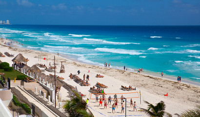 Mexico, Cancun. People relaxing and sunbathing on the beach