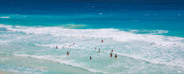 Mexico, Cancun. People relaxing and sunbathing on the beach