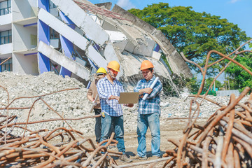 Engineer controls the work, smashing the building to create a new building - Image