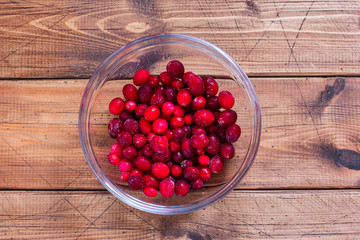 Step by step preparation of cranberry juice, step 1 - preparation of ingredients, top view, selective focus