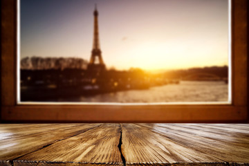 Table background and window sill space with Paris landscape 