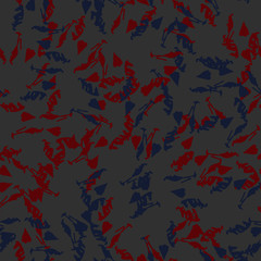Urban camouflage of various shades of grey, blue and red colors