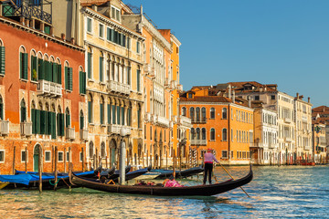 Fototapeta na wymiar A gondolier on the Grand Canal in Venice, Italy