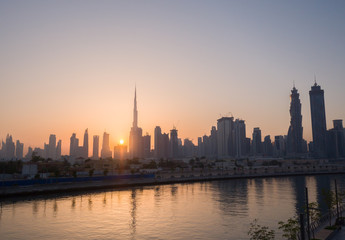 Panorama of the city of Dubai early in the morning at sunrise with a bridge over the city channel Dubai Greek.