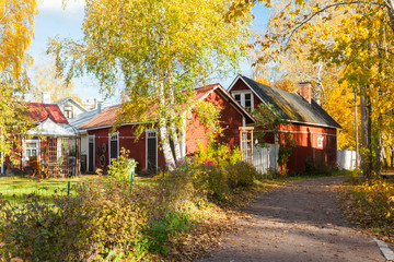 Fototapeta na wymiar KOUVOLA, FINLAND - OCTOBER 10, 2018: Beautiful autumn in old rustic museum district of Kouvola - Kaunisnurmi