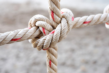Rope suspension bridge railing. selective focus