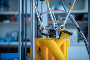 Print parts on a delta 3D printer in industrial lab