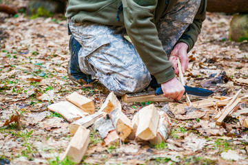 cutting a wooden stick