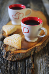 Valentine's Day: two cups of coffee and heart cookies