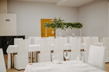 Wedding table decorated with bouquet and candles