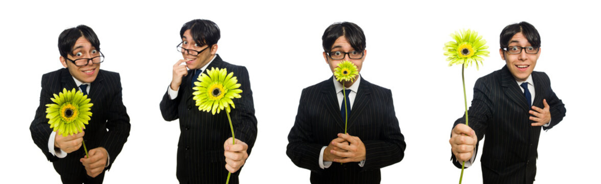 Young Man In Black Costume With Flower Isolated On White