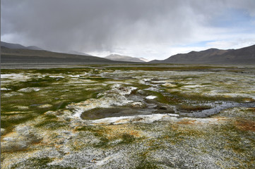 China, Tibet. Gray clouds over the lake Ngangla Ring Tso in summer
