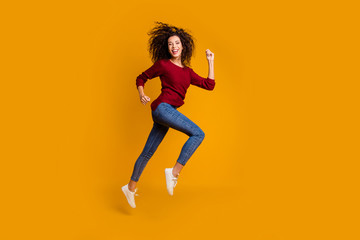 Fototapeta na wymiar Full length body size view of her she nice-looking lovely pretty attractive cheerful cheery sportive slim fit wavy-haired lady running strive purpose isolated on bright vivid shine orange background