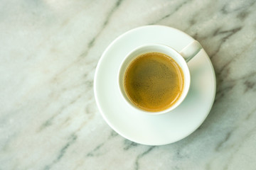 cup of coffee on marble table.