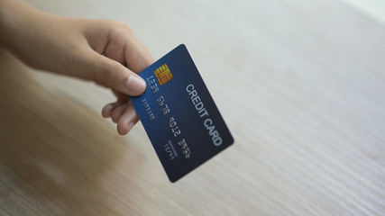 Using a credit card on hand, Banner for web - Image