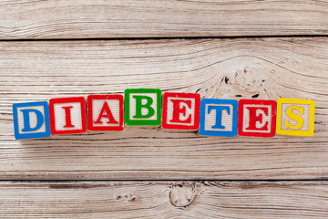 Fototapeta premium Wooden toy Blocks with the text: diabetes