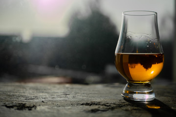 Irish Whiskey Glass Sunshine Shadow on Slate with Dublin Skyline