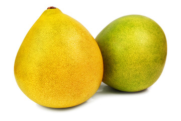 yellow and green pomelo on white
