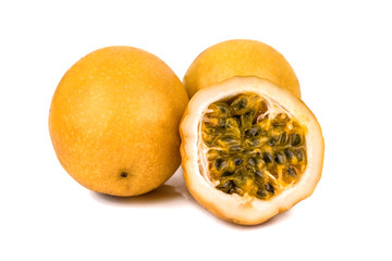 yellow passion fruits on white