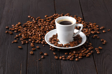 Cup with coffee and shape of heart