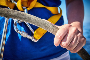 A man drives a yacht