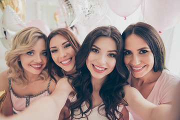 Self-portrait of nice-looking cute adorable winsome lovely attractive charming cheerful cheery girlfriends having fun in light white interior decorated house indoors