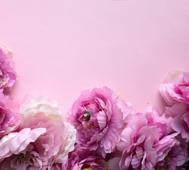 Peonies flowers on pink background. 8 March Woman's Day greeting card background.