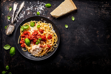 delicious appetizing classic spaghetti pasta with tomato sauce, parmesan