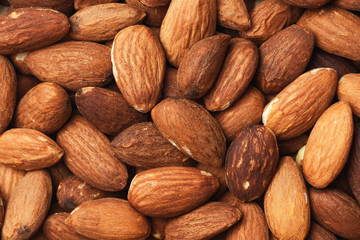 Raw almond nuts pattern. Helathy diet background.