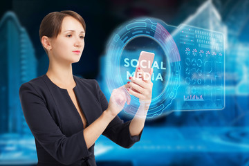 The concept of business, technology, the Internet and the network. A young entrepreneur working on a virtual screen of the future and sees the inscription: Social media