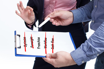 Business, technology, internet and networking concept. Young entrepreneur showing keyword: Franchise