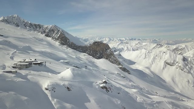 Aerial shot of snowcaped peaks of Alps