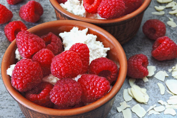 Healthy breakfast or snack with cottage cheese and fresh raspberries. Keto diet. Keto dessert or keto breakfast.