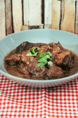 juicy grilled pork leg with fresh salad