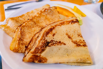 Close up shot of a dish with crepes