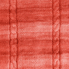 Knitted Living Coral texture. Color of the year 2019 concept. Background