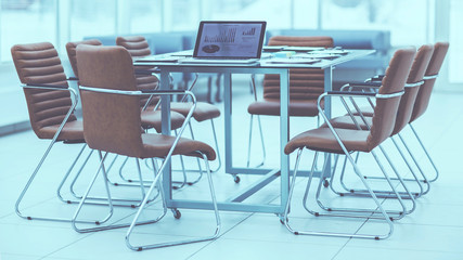  open laptop computer with marketing schemes and important documents on your desktop before you start brainstorming