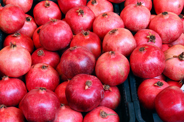Group of pomegranates. Pomegranate closeup, background