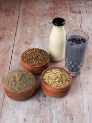 A glass of hemp and blueberry smoothie